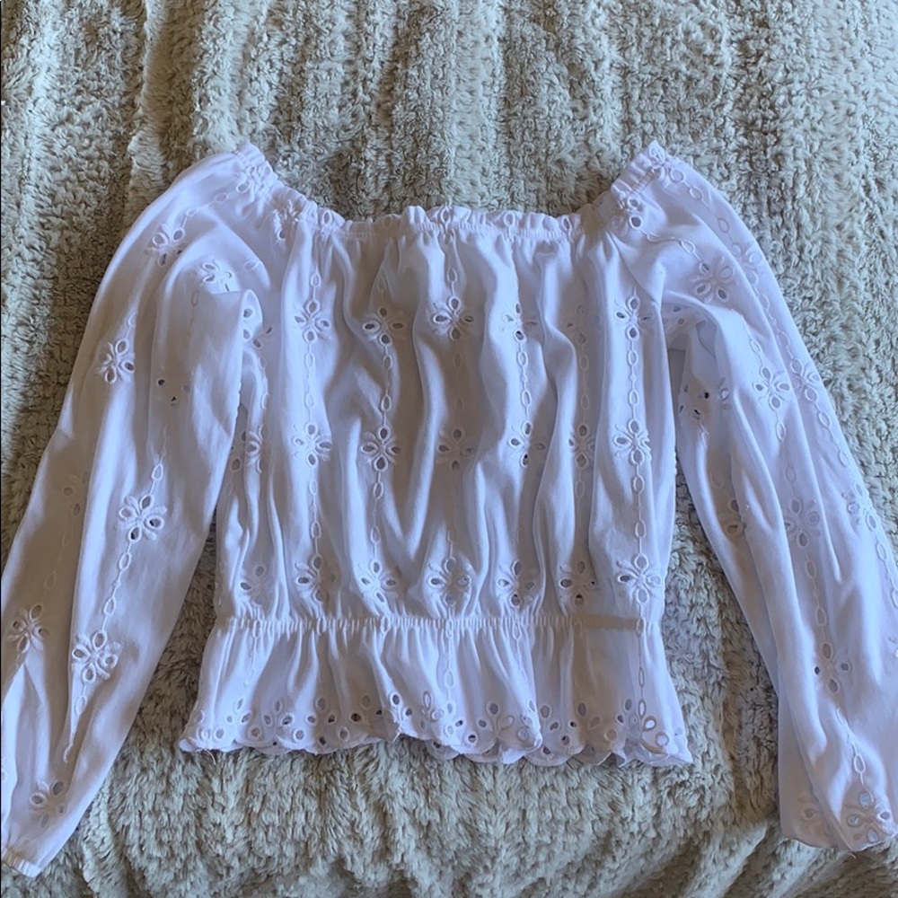 Off the shoulder, long sleeve shirt. New